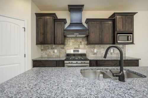 New Home Builder with Custom Wood Range Hood