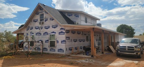 Home Addition in progress with Wall Sheathing and Wrapping