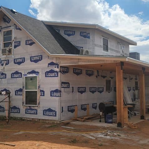 Home Addition in progress with Wall Sheathing and Wrapping